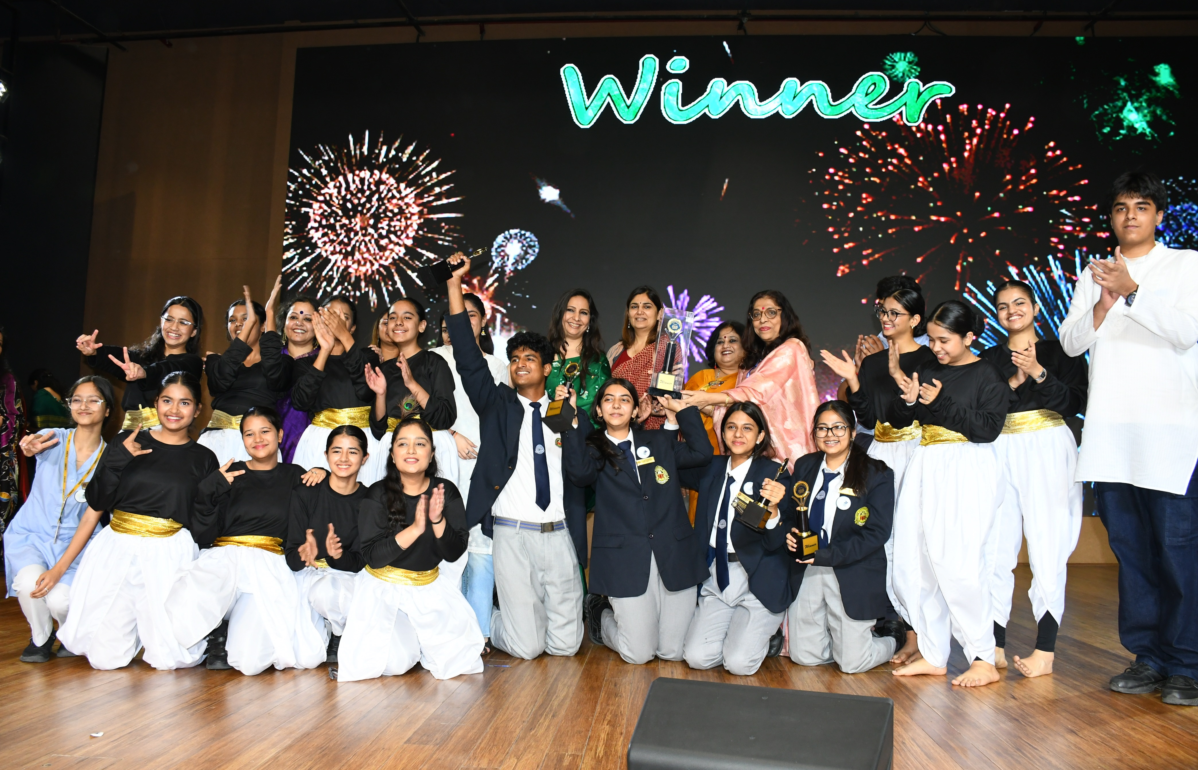 Amity International School Noida & Amity International School Pushp Vihar Delhi, jointly lift the Winner&rsquo;s Trophy during the Grand Finale of 17th &ldquo;Youth Power&rdquo;